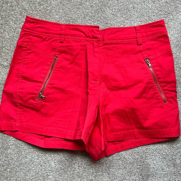 Red shorts with zipper detail in US 2. Fits big. Worn only once. - Picture 1 of 5